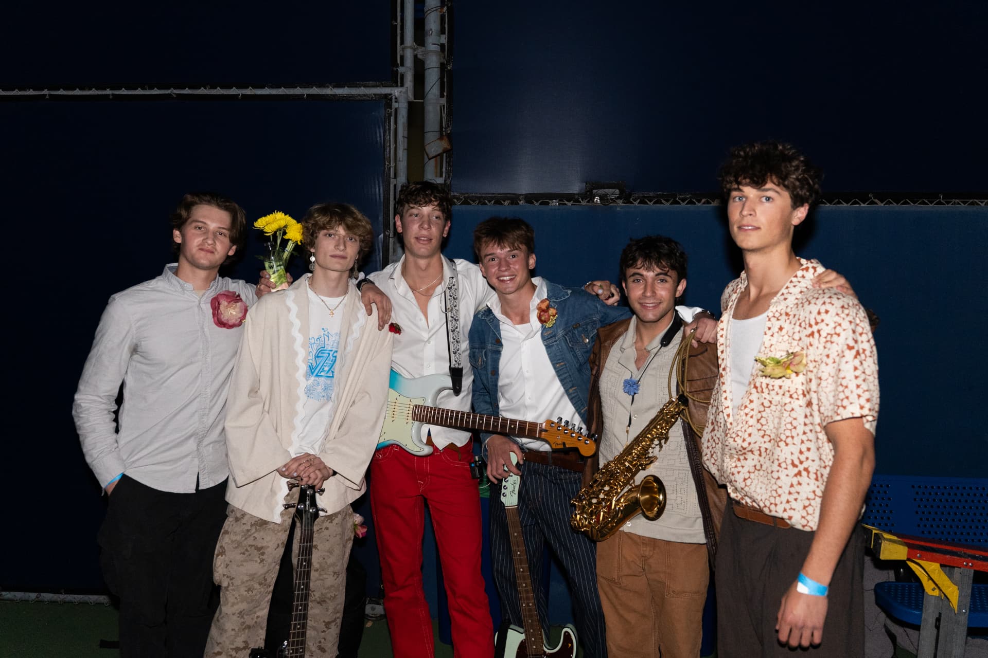 The six members of The 529s backstage with their instruments
